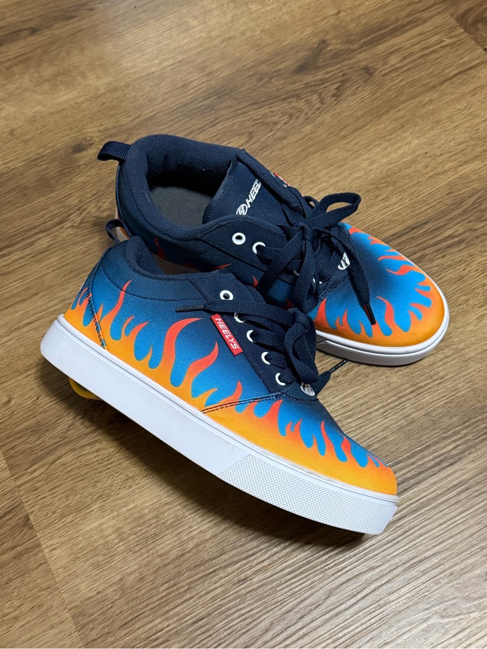 Heelys Navy Blue and Orange Flame Roller Sneakers